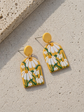 Ατσάλινα Σκουλαρίκια • Yellow Daisies